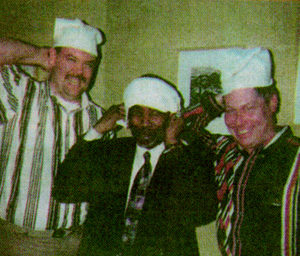 White supremacists Kirk Lyons, left and Neill Payne, right pretend they are Klansmen along with Edgerton, who is giving the term “handkerchief head” whole new meaning.