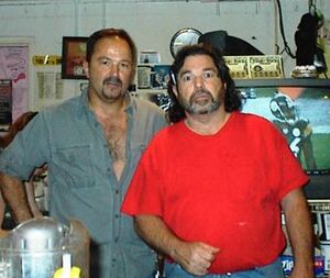 There is some confusion that needs to be cleared up. Patrick Vince Lanzo is on the left in this picture. Charles Patrick Lanzo is on the right in the red shirt. Patrick Vince is the one who owns the Georgia Peach Museum, and the one who belongs in our Rogues' Gallery. Yes, they are brothers.