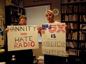 People protesting Sean Hannity's shows.